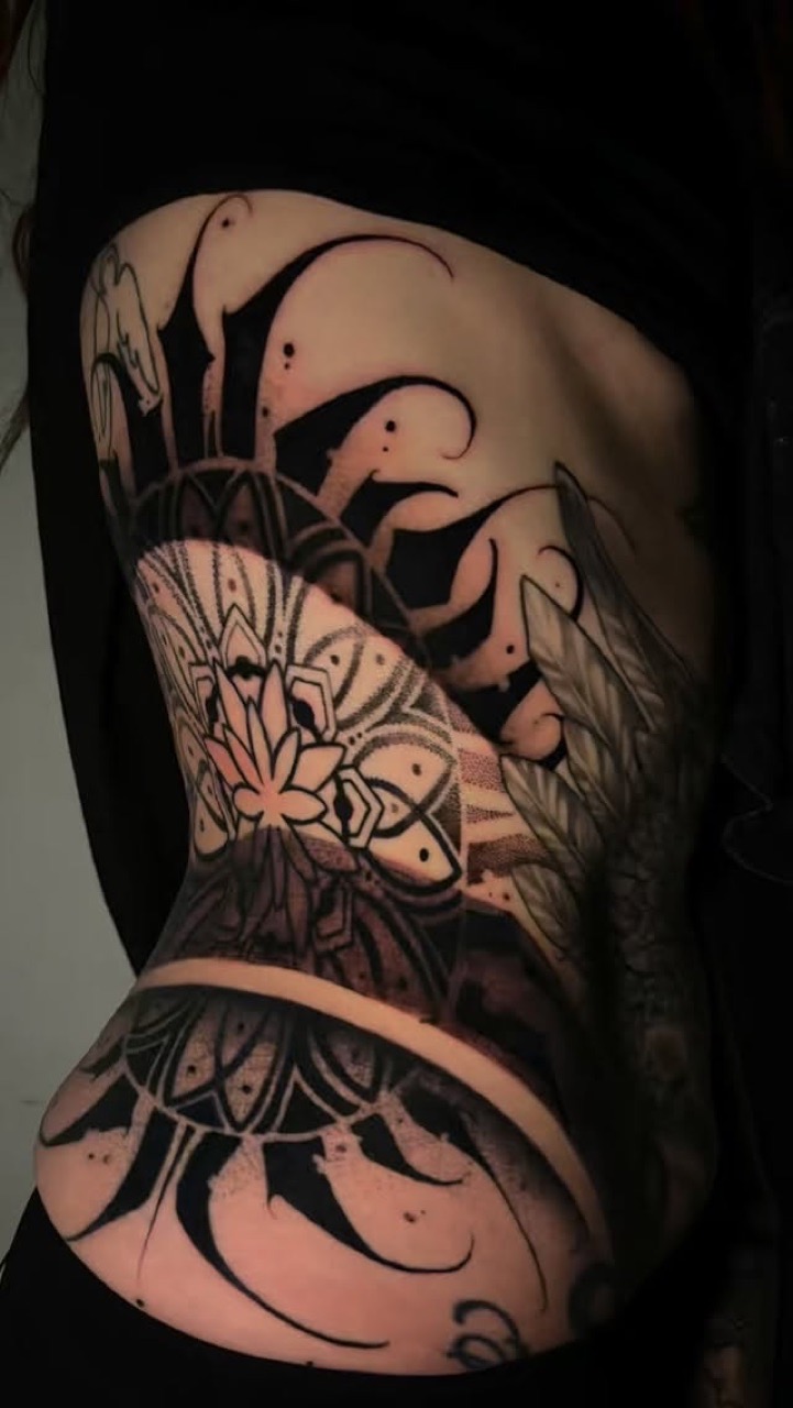 Solid black dark art tattoo by Yæ at Yes Electric Tattoo Toronto